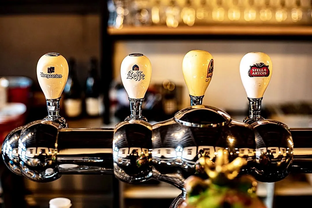 The beer taps: Hoegaarden, Leffe and Stella Artois